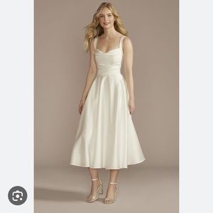 A-line tea length dress in the color soft white